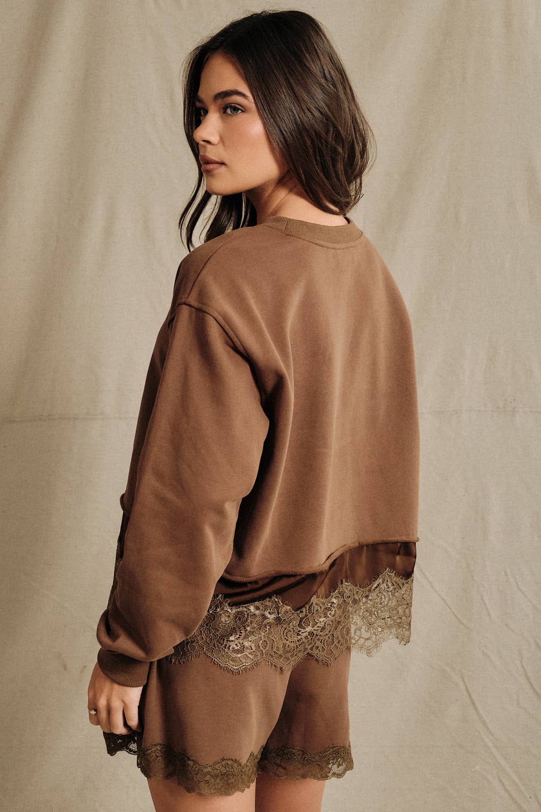 Round Neck Lace Trimmed Hem Long Sleeve Sweatshirt