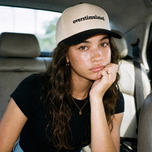 C.C OVERSTIMULATED Letter Embroidered Two Tone Trucker Cap