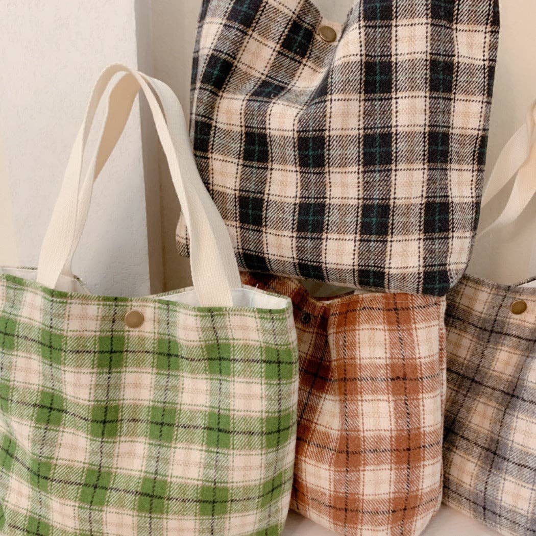 Small plaid handbag with short handles.