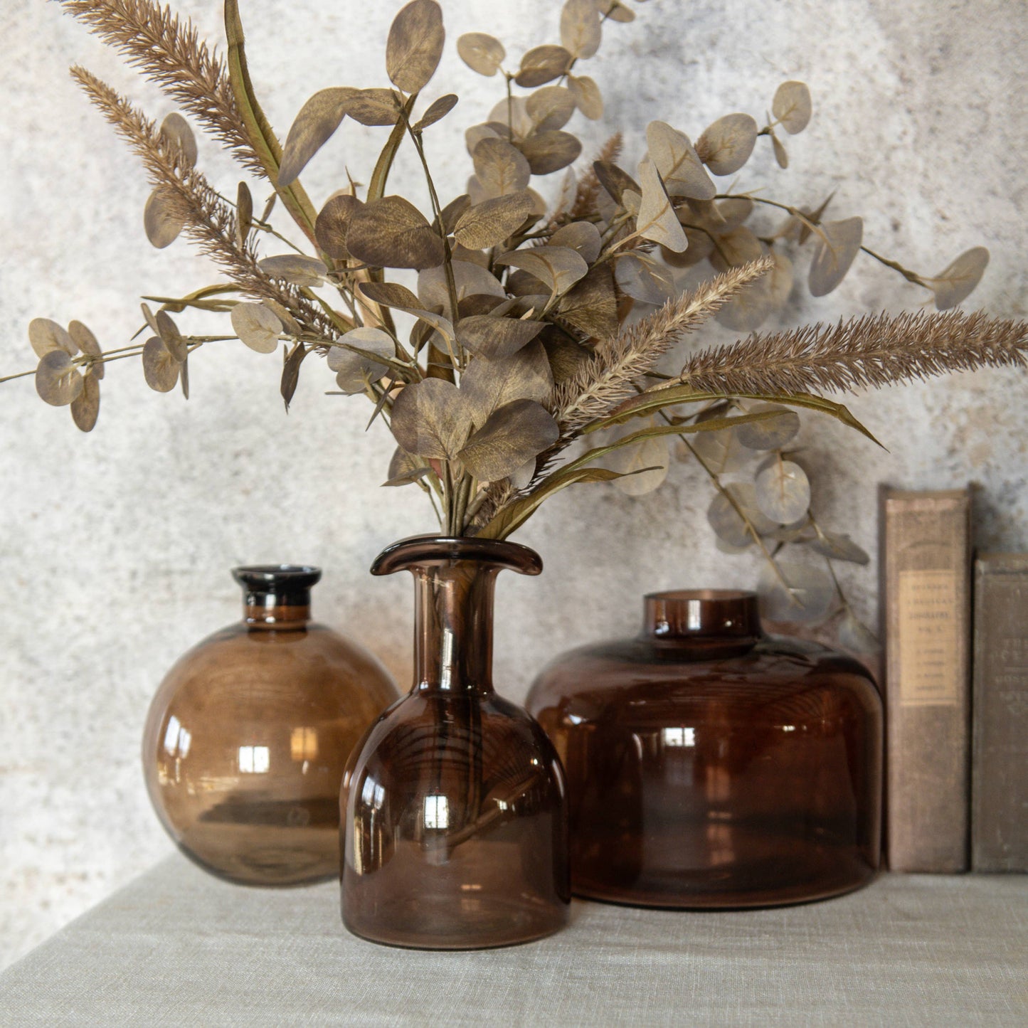 7" BROWN ROUNDED GLASS VASE