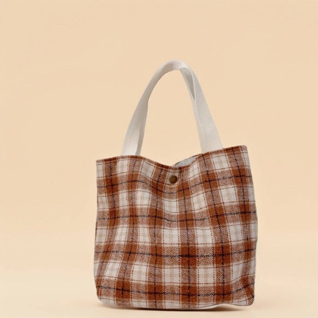 Small plaid handbag with short handles.
