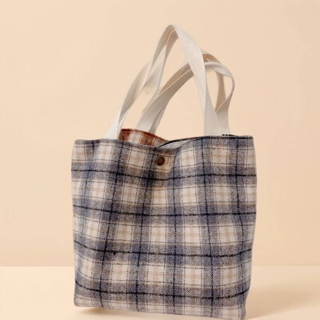 Small plaid handbag with short handles.