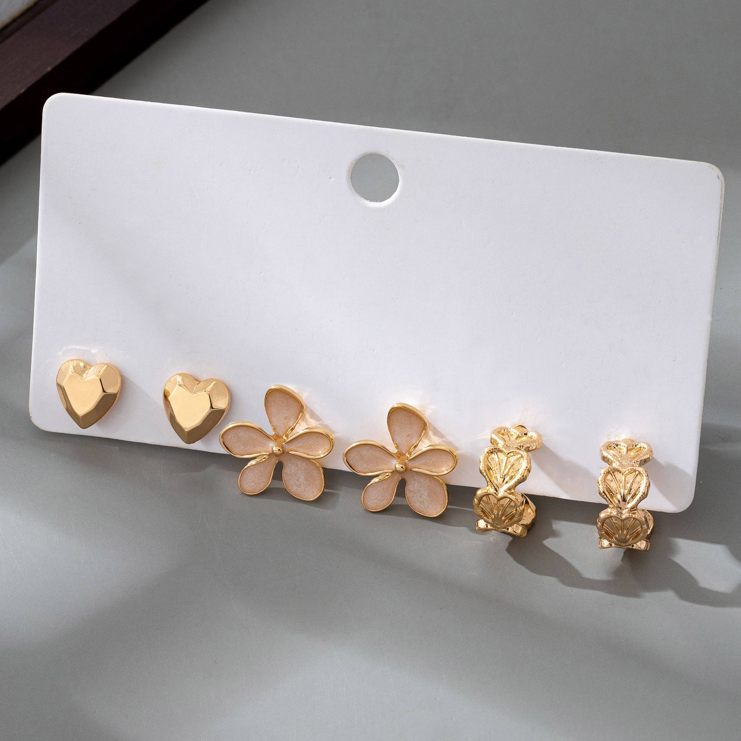 TRIO HEART FLOWER SEASHELL HUGGIE HOOP EARRINGS